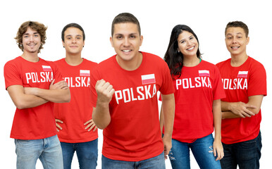 Cheering football fan from Poland with group of polish supporters