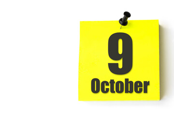 October 9th. Day 9 of month, Calendar date. Yellow sheet of the calendar. Autumn month, day of the year concept.