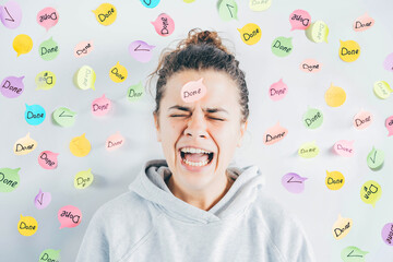 Woman with sticky note on her forehead.