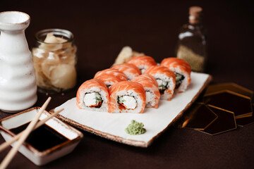 Set of sushi rolls philadelphia with red fish