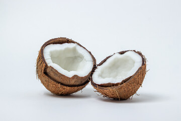 Isolated coconut on a white background. Two halves of a coconut. Healthy food