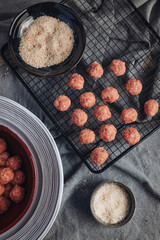 Raw home made Italian traditional meatballs