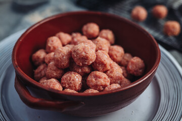 Raw home made Italian traditional meatballs
