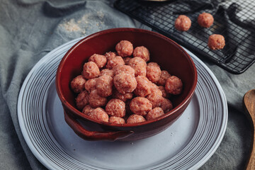 Raw home made Italian traditional meatballs
