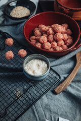 Raw home made Italian traditional meatballs