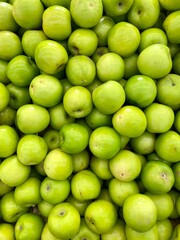 Close-up photo of  Taiwan's big jujube in market. Group of sweet dates fruit background.