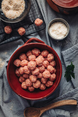 Raw home made Italian traditional meatballs