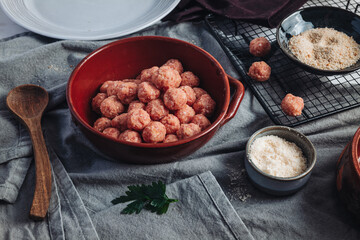 Raw home made Italian traditional meatballs