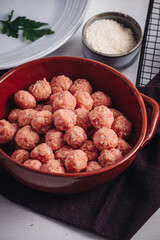 Raw home made Italian traditional meatballs