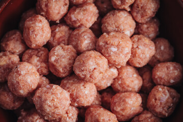 Raw home made Italian traditional meatballs