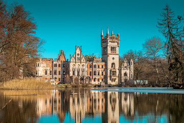 Closeup shot of the ruins of the palace in Kopice Poland reflected in the water