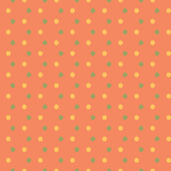 Polka dot seamless pattern. Green and yellow spots on coral color background. Bright and cute vector illustration.