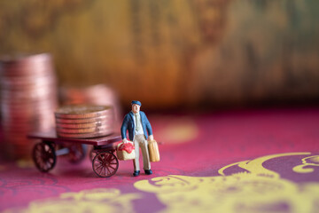 Miniature : Shopping men stand next to coins and rickshaws. Vintage business concept background.