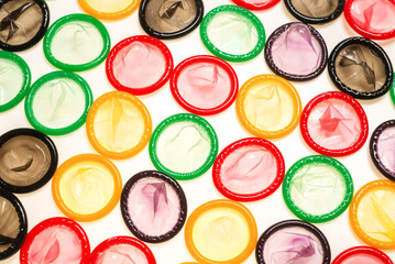 Colorful condoms background.