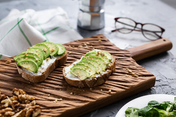sliced avocado on toast bread with nuts