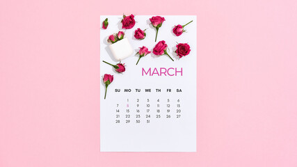 8 March. Little roses on march calendar leaf over pink pastel background