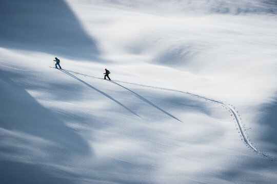 Two people skiing in the Alps, Lienz, Austria