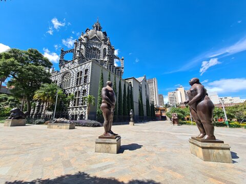 Sculptures by Fernando Botero in Plaza Botero and beautiful blue sky.  Culture palace. Medellin, Antioquia, Colombia Stock Photo | Adobe Stock