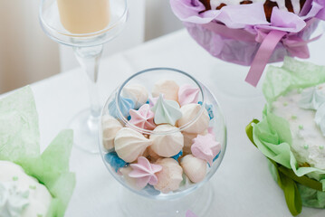 Beautiful Easter cakes on a decorated light table. A light holiday of Easter.