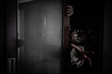 Portrait of asian woman make up ghost,Scary horror scene for background,Halloween festival concept,Ghost movies poster