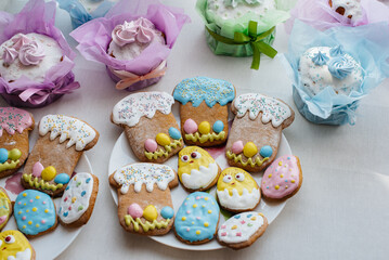 Beautiful Easter cakes on a decorated light table. A light holiday of Easter.