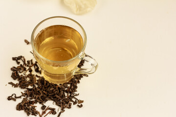 Cup pf green tea with tea leaves. Top view, stock photo