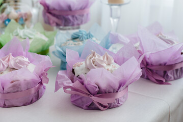 Beautiful Easter cakes on a decorated light table. A light holiday of Easter.