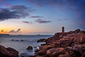 Lighthouse of Ploumanach at sunset in Perros-Guirec, Côtes d'Armor, Brittany, France