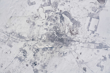 Satellite view of a city in Kazakhstan. Digital Enhancement. Elements of this image furnished by NASA