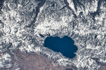 Satellite view of a water reservoir over California. Digital Enhancement. Elements of this image furnished by NASA