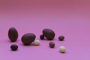 Construction from white, milk and dark chocolate eggs for Easter.