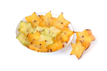 Slices of averrhoa carambola in a saucer isolated on white