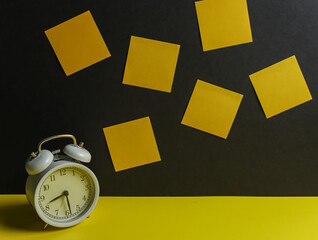 yellow note with clock