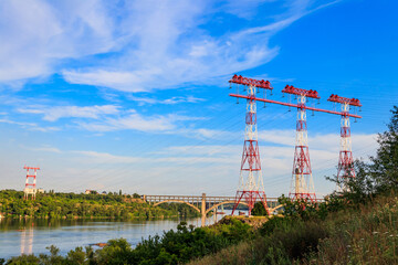 High voltage power line across the Dnieper river on Khortytsia island in Zaporizhia, Ukraine