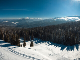 Fototapeta na wymiar Panoramic view in winter mountains. 
