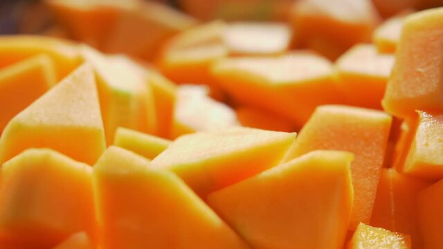 Close-up of chopped pieces of fresh cantaloupe melon