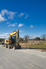 vertical shot, new development area, power shovel, digger, construction vehicle