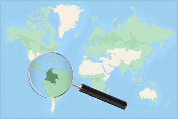 Map of the world with a magnifying glass on a map of Colombia.