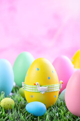 Easter eggs on the green grass.