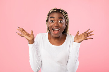 Close up portrait of shocked young black woman screaming