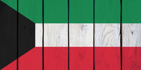 national flag of Kuwait on wooden texture