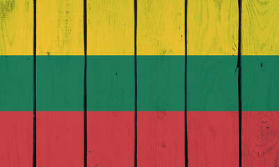 Lithuanian national flag on wooden texture