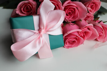 postcard mockup with roses, envelope and white blank for text 