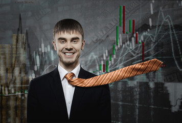 happy businessman trader on dark diagram background