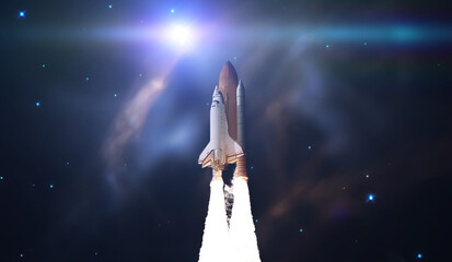 the abstract intergalactic spaceship shuttle fly to the stars in outer space. elements of this image furnished by nasa