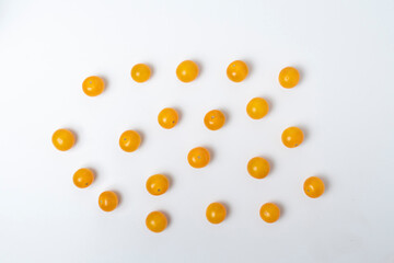 view from above orange color cherry tomatoes flay lay, simple minimalist style