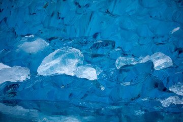 USA, Alaska, Close-up view of deep blue iceberg floating near calving face of LeConte Glacier east of Petersburg