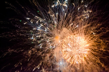 festive fireworks in the night black sky