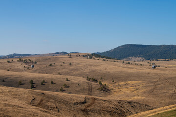 Transportation via Cable Car (Gondola lift), way to Zlatibor mountain, National park. Sunny winter day, with beautiful landscape and blue sky in background. Ski resort.