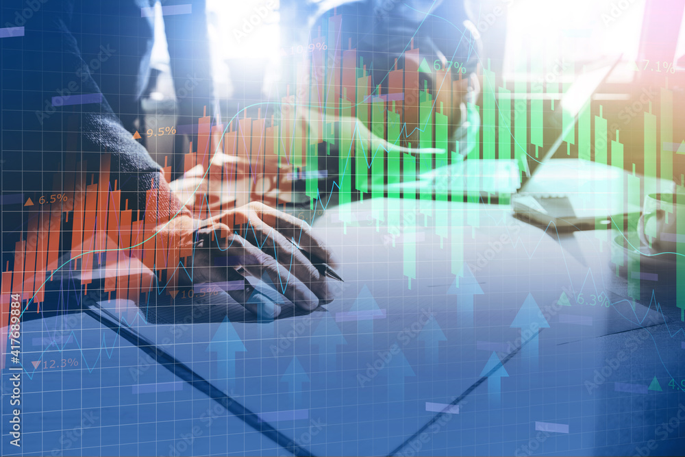 Poster team working in computer with graph